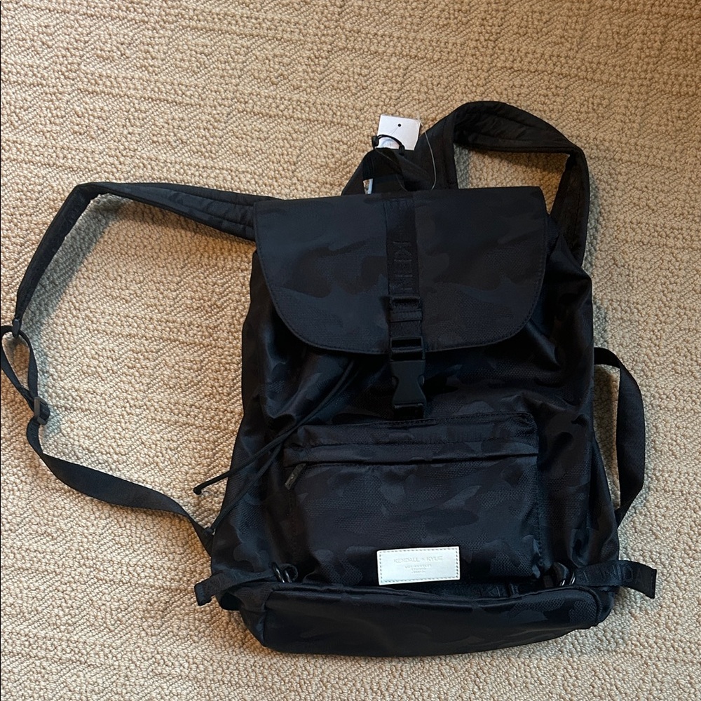 Stylish Black Backpack for women- camo fabric
New with tags 15” h x 13” w